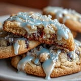 Pure Vanilla Cookie Run Kingdom sugar cookies decorated with royal icing in blue and gold, inspired by the beloved game character. Soft vanilla cookies with glossy icing, perfect for themed parties and dessert tables. Classic sugar cookies topped with detailed royal icing decorations, capturing the essence of Pure Vanilla Cookie from Cookie Run Kingdom.