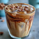 Rich and invigorating brown sugar oat milk shaken espresso, sweetened with brown sugar and served over ice for a cool, energizing drink.  