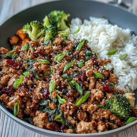 Savory Korean-Style Ground Turkey simmered in a glossy, spicy-sweet sauce flecked with toasted sesame seeds.