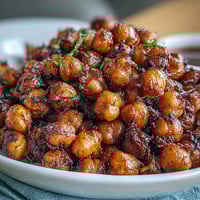 Golden, crispy roasted chickpeas seasoned with smoky paprika and cumin.